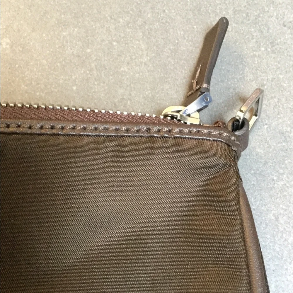 NWOT Petite Tumi dark brown cosmetic bag